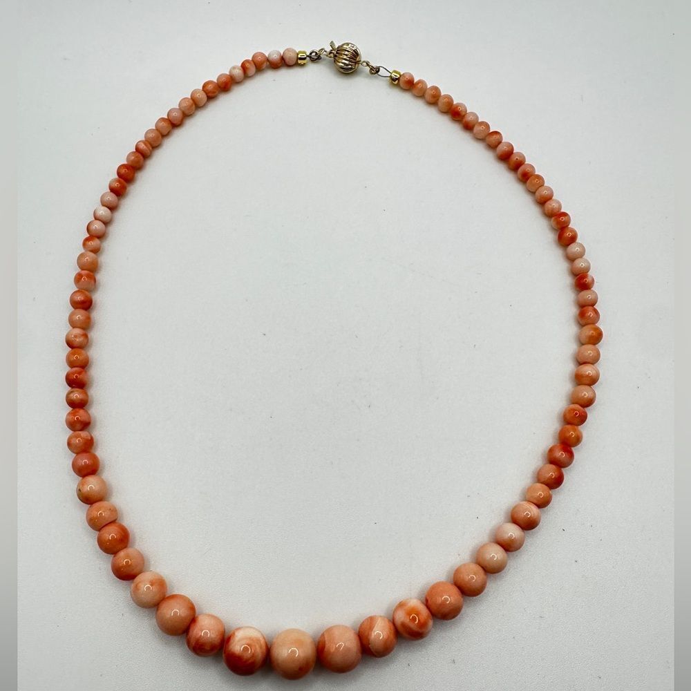 16" Graduated Angel Skin Coral beaded necklace with 14kt yellow gold clasp!